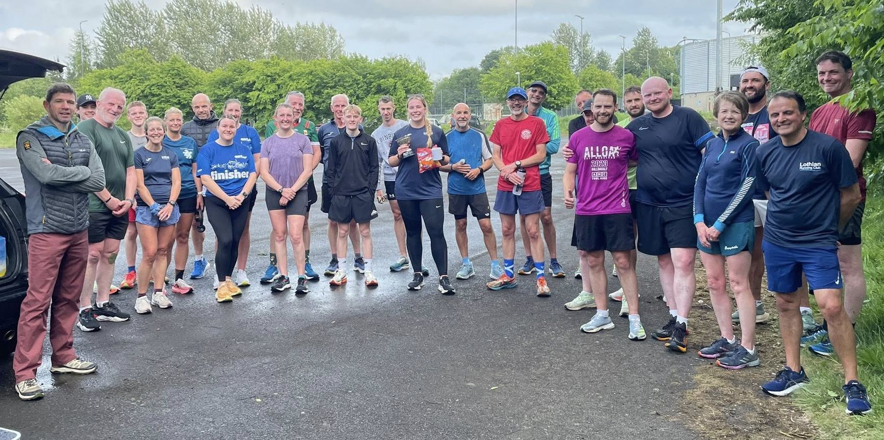 Competitors line up for photo after the race