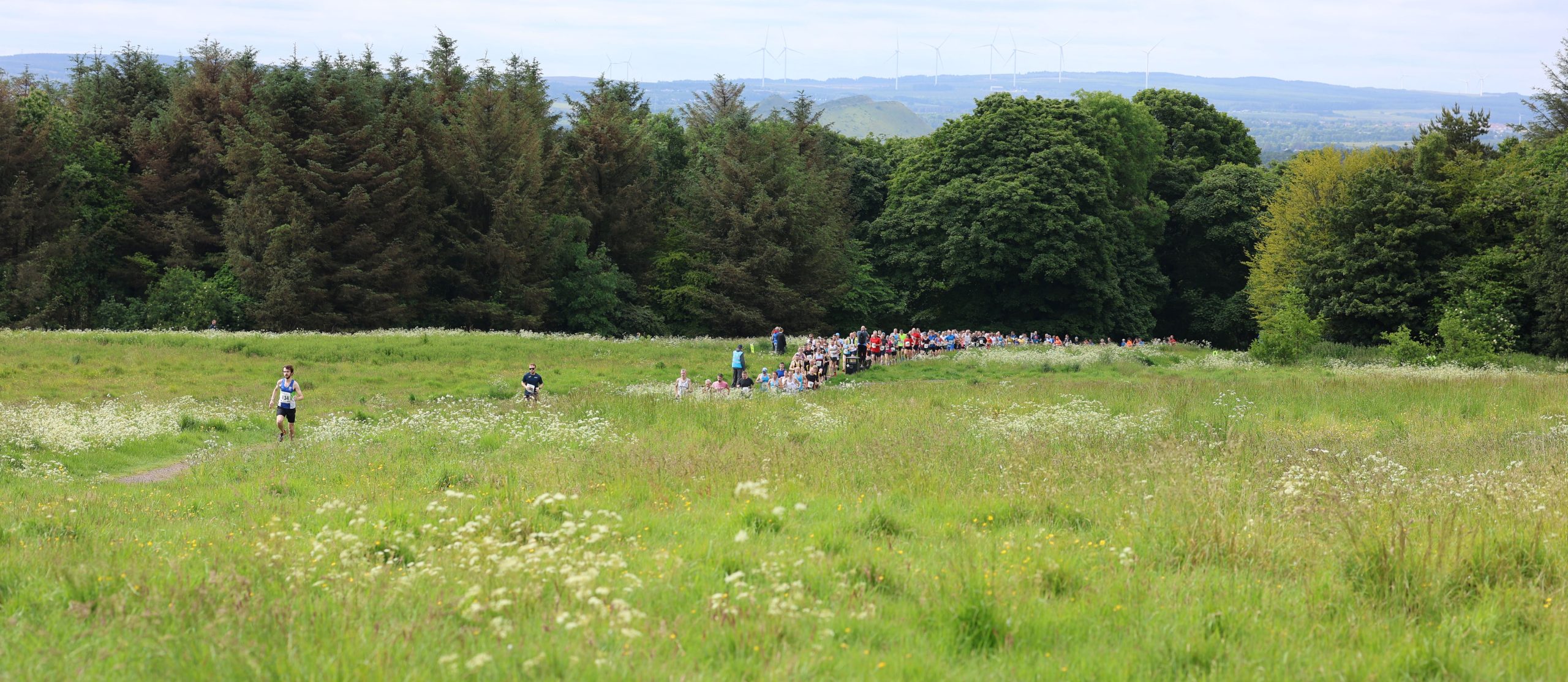 A trail of runners embark on the 2025 dechmont trail race.